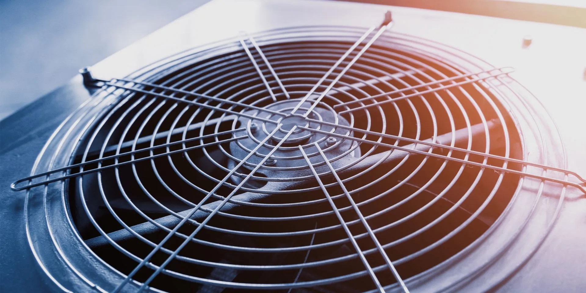 Close-up of an air conditioning condenser fan unit